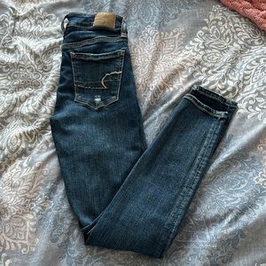 American Eagle “next-level stretch” ripped high rise skinny jeans. Size US 0